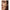 Woman applying Ané Glow in a Bottle face oil